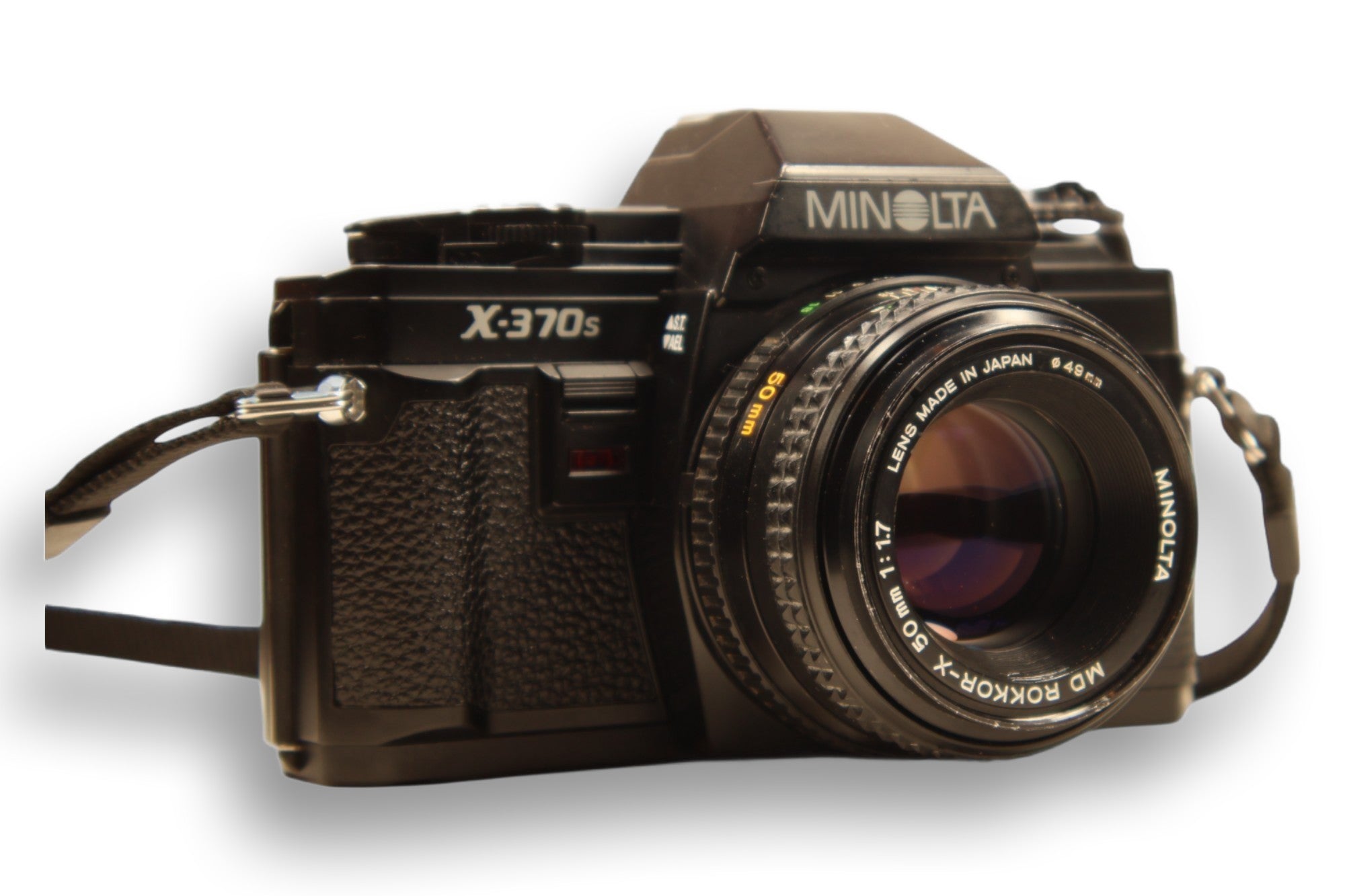 Minolta X-370S 35mm film camera with 50mm f/1.7 lens, featuring a black body and textured grip. Ideal for students and vintage photography enthusiasts.