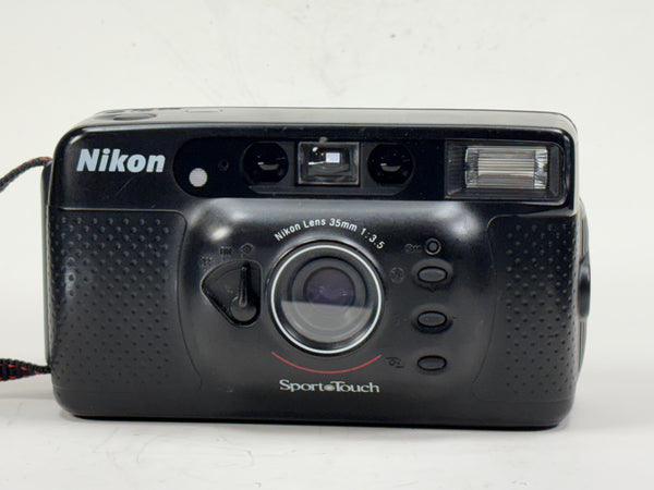 Nikon Sport Touch 35mm film camera with fixed 35mm f/3.5 lens and built-in flash, ideal for students and vintage photography lovers.