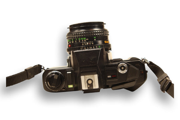 Top view of Minolta X-370S camera, displaying shutter speed dial, hot shoe, and film advance lever. A classic 35mm SLR for vintage camera lovers.
