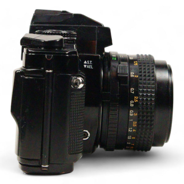 Minolta X-570 35mm film camera with a 50mm 2.0 prime lens